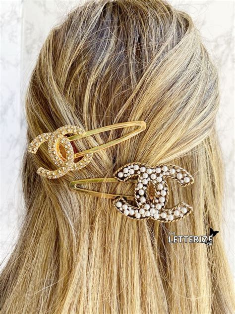 replica chanel hair clips|Chanel accessory.